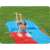 A boy sliding down the Bestway H2OGO Tsunami Splash Ramp double lane water slide