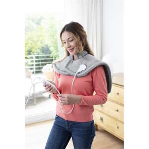 Medisana HP622 Neck and Shoulder Heat Pad, gray, woman wearing it - Warming cushion