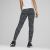 Nő visel Puma ESS+ Blossom AOP fekete virágmintás leggingset, hátulról nézve, kiemelve a teljes hosszt és az illeszkedést