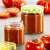DELLA CASA 125 ml glass jar with colorful lid, filled with tomato sauce, perfect for preserving homemade sauces and jams.
