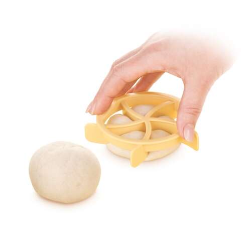 Tescoma DELÍCIA bread roll mold, 11 cm diameter, beige plastic, used to shape dough