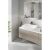 Grohe Cubeo XL magas mosdócsaptelep modern matt fekete kivitelben, fehér pultra szerelhető mosdóval egy minimalista fürdőszobában.