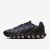 Egyetlen fekete és sötétkék Nike Air Max DN8 edzőcipő, bal oldali profilnézet, fehér alapon, bemutatva a dinamikus talpszerkezetet