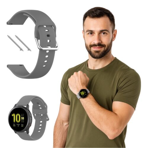 Férfi okosórát visel szürke szilikonszíjjal; a szürke 20 mm-es szilikonszíj és rugós stiftek, valamint egy okosóra szíjjal termék megjelenítése 
