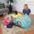 Fisher-Price inflatable car ball pit, blue car with colorful balls, for toddlers, in a living room