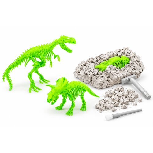 Dinószaurusz Fényes Készletek T-Rex és Triceratops dinoszaurusz csontvázak, ásatási blokk, kalapács és ecset fehér háttéren, világító zöld színben. - Tudományos és felfedező játék