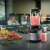 Philips 7000 series blender, black and stainless steel, making a smoothie