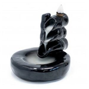 Schwarzer Keramik-Rückfluss-Räuchergefäß mit Rauch - Innenarchitektur