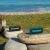 Tronsmart Trip waterproof portable Bluetooth speakers on rocks outdoors
