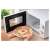 Sencor SMW 1918WH microwave oven, white, pizza being taken out