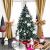 Decorated Springos Christmas tree with gifts and decorations in a festive setting