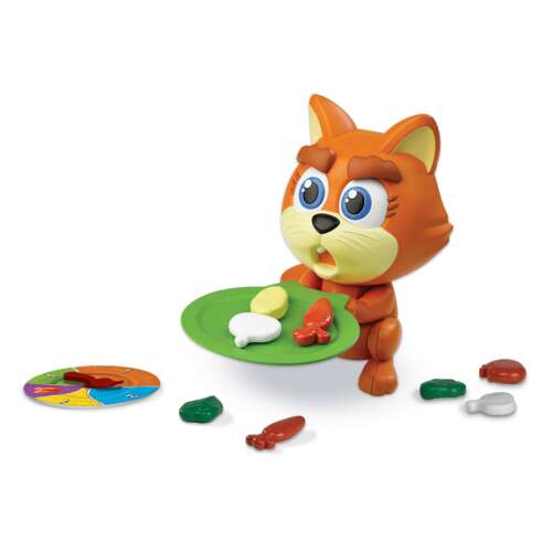 Finnyás Cicus board game, a playful cat figure with a plate of vegetables, a spinner, and vegetable tokens