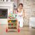 Baby using Timeless Tools Multifunctional Wooden Walker for learning to walk