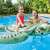 Intex 57555 Inflatable Turtle Ride-On, 191 x 170 cm, green with floral design, child riding in pool