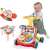 Pepita 3-in-1 interactive walker and activity table, red, child using the walker