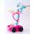 Pink medical cart toy with EKG machine, light and sound effects, and 17 accessories