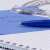 Schneider K15 blue ballpoint pen, 0.5mm, writing in notebook