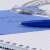 Schneider K15 blue ballpoint pen, 0.5mm, writing in notebook