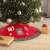 Red and gray Christmas tree skirt with Santa Claus, candy cane, and snowflake design