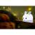Neno Titto rabbit night light, white with green ears, on a table