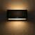 Avide Lima E27 outdoor wall light mounted on a wall, turned on