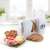 Domo MS171 electric food slicer, white, slicing bread and cheese