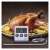 Emos digital cooking thermometer with probe, showing current and set temperature, used to measure the temperature of a roasted chicken