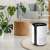 Home by Somogyi Air 18 WiFi Air Purifier, white, in a living room