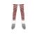 Close-up of striped legs of a red Christmas gnome decoration