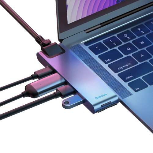 Адаптер Baseus 7 в 1 USB-C Hub за MacBook, показва адаптера, свързан към MacBook и различни свързани кабели
