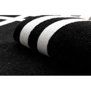 Közelkép a Hampton Lux fekete-fehér kerek szőnyegről - 140 cm - Lux