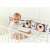 Baby playing with GaGaGu black and white developmental book with cow, monkey, dalmatian, penguin and panda