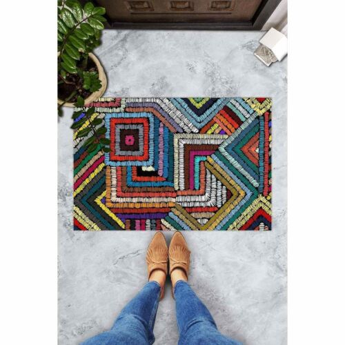 Colorful doormat with geometric pattern in use at the entrance
