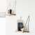 Pair of rustic wooden hanging shelves with rope, perfect for displaying small items.