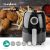 Nedis KAAF120FBK hot air fryer with fried chicken and fries