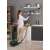 Woman using Hoover HP330ALG bagless vacuum cleaner to clean high places