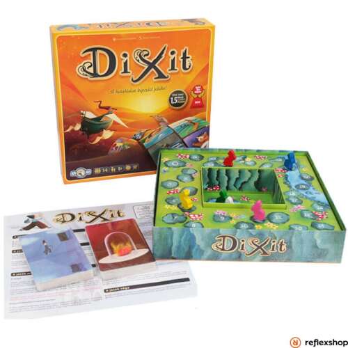 Dixit társasjáték doboz nyitva, a játék elemei láthatóak, beleértve a kártyákat, a zsetonokat és a játéktáblát