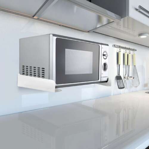 Mikrohullámú sütő fehér fali konzolon, modern konyhában