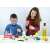 Two children wearing safety goggles using the Buki Chimie Chemistry 150 experiments science kit for kids