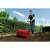 Man using Einhell GC-GR 57 lawn roller on a lawn