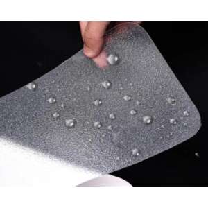 Close-up of clear anti-slip tape with water droplets, showing its waterproof and wear-resistant properties, safety, home, stairs, steps, grip, traction, prevent falls, easy to apply, durable, waterproof, wear-resistant - Work Safety