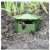 Green plastic slug trap in garden, slug trap for garden, snail trap for garden