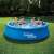 Family enjoying Summer Waves inflatable pool