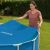 Woman installing Intex Solar Pool Cover