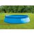 Intex Easy Set pool with blue solar cover in backyard