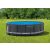 Intex metal frame pool covered with blue solar cover