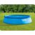 Intex Easy Set pool covered with blue solar cover