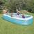 Family enjoying the Intex 305x183x56 cm inflatable family pool, blue
