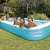 Family enjoying the Intex 305x183x56 cm inflatable family pool, blue