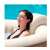 Woman relaxing in a hot tub with Intex PureSpa inflatable headrest